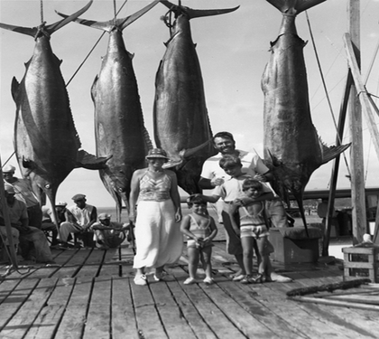 animage of ernest hemingway with a large catch of marlin